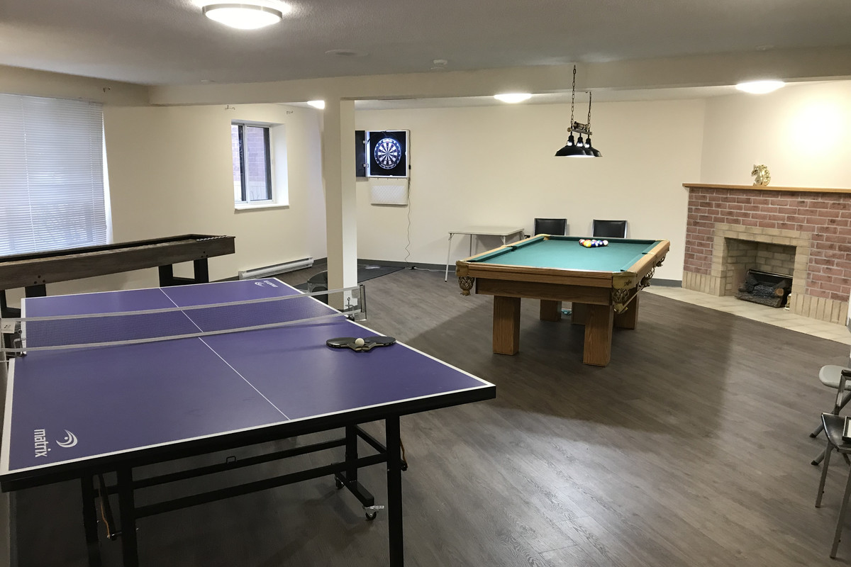 Photo of lounge / recreation room. Large recreation room at Zerin Place; the recreation room has a billiards table, darts, table tennis and table shuffleboard.